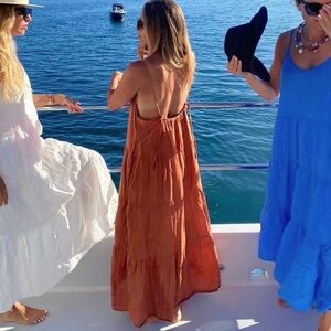 Left on Friday Sunday Linen Dress in rust colour.